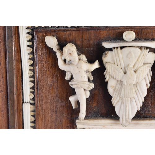 6 - A 17TH/18TH CENTURY CONTINENTAL CARVED BONE AND FRUITWOOD PANEL depicting saints and other figures. ... 