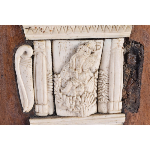 6 - A 17TH/18TH CENTURY CONTINENTAL CARVED BONE AND FRUITWOOD PANEL depicting saints and other figures. ... 