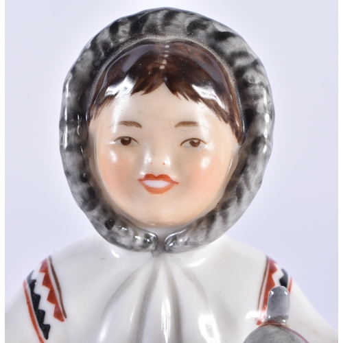 71 - AN UNUSUAL USSR PORCELAIN FIGURE OF A FISHER WOMEN. 15 cm high.