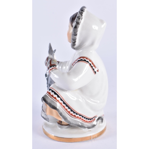 71 - AN UNUSUAL USSR PORCELAIN FIGURE OF A FISHER WOMEN. 15 cm high.