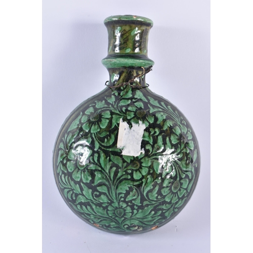 72 - AN UNUSUAL 19TH CENTURY MIDDLE EASTERN INDIAN POTTERY FLASK Mughal type, painted with green flowers.... 