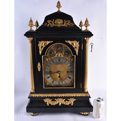 727 - A LARGE VICTORIAN EBONISED BRACKET CLOCK with four silvered dials. 64 cm x 36 cm.