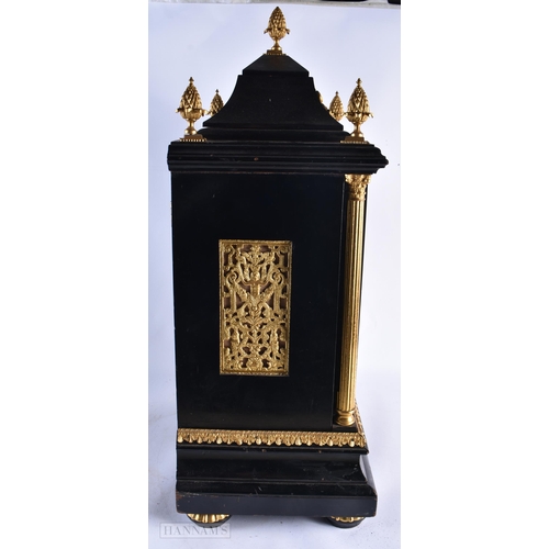 727 - A LARGE VICTORIAN EBONISED BRACKET CLOCK with four silvered dials. 64 cm x 36 cm.