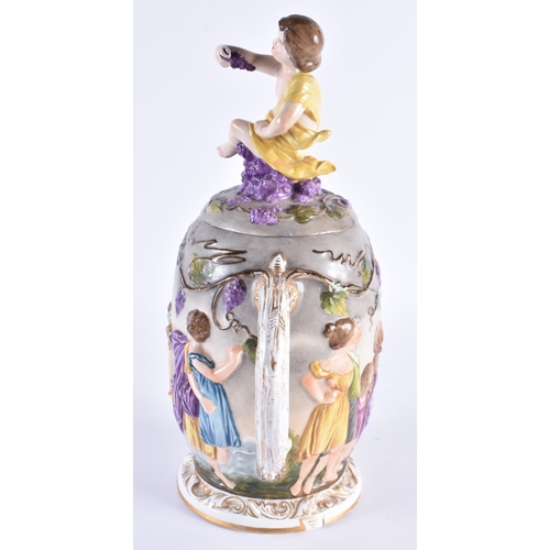 74 - A LARGE ITALIAN NAPLES PORCELAIN CUP AND COVER decorated with classical scenes. 31 cm high.