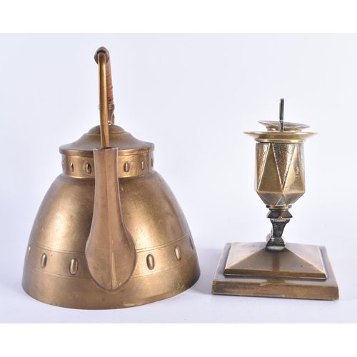 75 - A LATE 19TH CENTURY SECCIONIST MOVEMENT BRASS KETTLE together with a similar candlestick. Largest 18... 