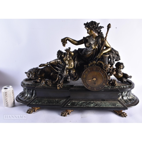 755 - A FINE LARGE 19TH CENTURY FRENCH BRONZE AND MARBLE CLOCK formed as a reclining female feeding fawns.... 