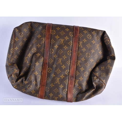 761 - A LOUIS VUITTON LEATHER BAG. 42 cm wide.