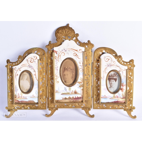 772 - A LATE 19TH CENTURY AUSTRIAN SWISS ENAMEL FRAME painted with figures in landscapes. 20 cm x 13 cm.