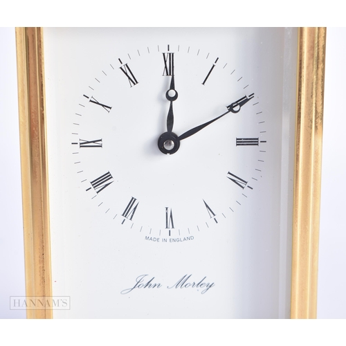 773 - John Morley Brass Carriage Clock. 15 cm high inc handle.