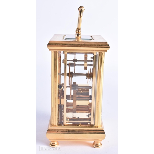 773 - John Morley Brass Carriage Clock. 15 cm high inc handle.