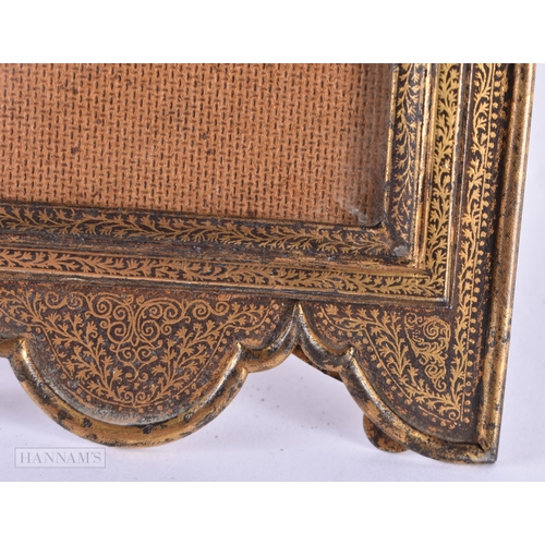 774 - A RARE 19TH CENTURY TURKISH OTTOMAN GOLD DAMASCANED IRON PHOTOGRAPH FRAME decorated with foliage. 22... 