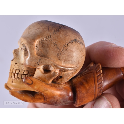 790 - AN ANTIQUE SKULL MEERSCHAUM PIPE. 14 cm long.