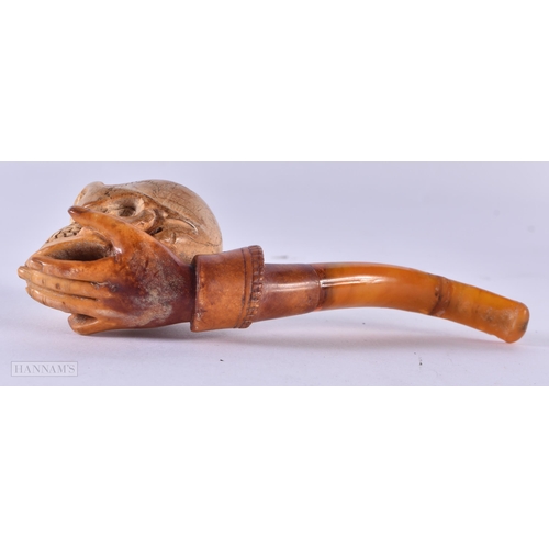 790 - AN ANTIQUE SKULL MEERSCHAUM PIPE. 14 cm long.