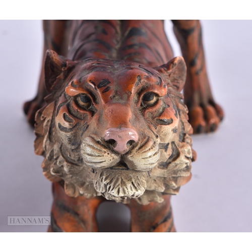 797 - A PAIR OF CONTINENTAL COLD PAINTED BRONZE TIGERS. 23 cm high.