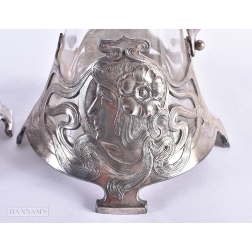 801 - A LOVELY PAIR OF ART NOUVEAU PEWTER WMF CLARET JUGS. 40 cm high.