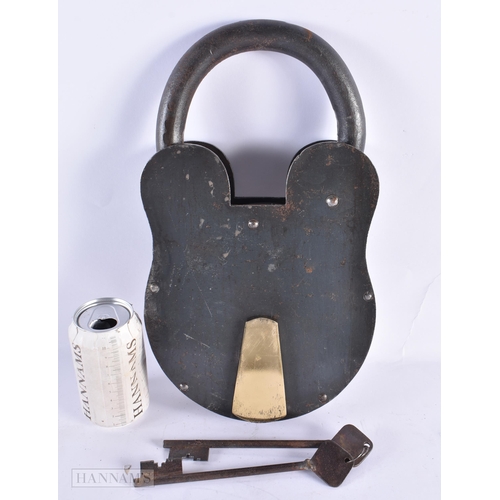 803 - A LARGE NOVELTY IRON PADLOCK with two keys. 36 cm x 22 cm. (3)