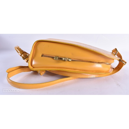 805 - A LOUIS VUITTON YELLOW SHOULDER BAG. Bag excluding straps 27 cm x 20 cm.