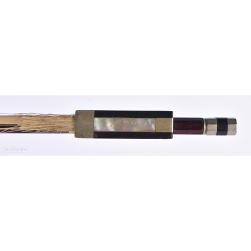 815 - A VIOLIN BOW by Schultz. 72 cm long.