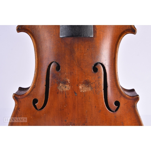 816 - AN ANTIQUE VIOLIN bearing label to interior Joseph Guarnerius. 59 cm long, length of back not inc hu... 