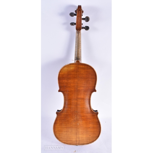 816 - AN ANTIQUE VIOLIN bearing label to interior Joseph Guarnerius. 59 cm long, length of back not inc hu... 