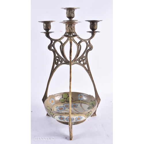 817 - A CONTINENTAL BRONZE AND CERAMIC CENTREPIECE decorated with stylised flowers. 42 cm high.