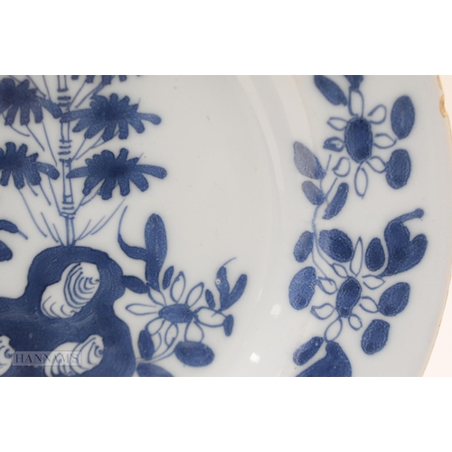 827 - 18th century English delft plate painted in blue with a chrysanthemum, bamboo and holed rock, with f... 