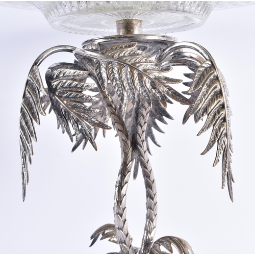 83 - A LARGE VICTORIAN SILVER PLATED CUT GLASS CENTREPIECE formed with bamboo trees and acanthus. 58 cm x... 