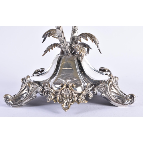 83 - A LARGE VICTORIAN SILVER PLATED CUT GLASS CENTREPIECE formed with bamboo trees and acanthus. 58 cm x... 