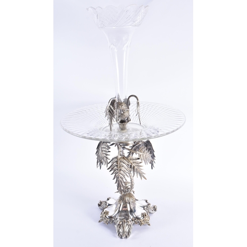 83 - A LARGE VICTORIAN SILVER PLATED CUT GLASS CENTREPIECE formed with bamboo trees and acanthus. 58 cm x... 