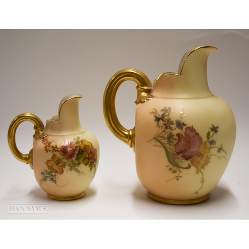 840 - Royal Worcester large jug with blush ivory ground painted with flowers and another of smaller size, ... 