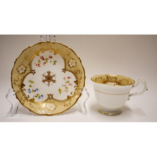 843 - Mid-19th century English teawares: A Coalport cup and saucer painted with flowers pattern 5570, two ... 