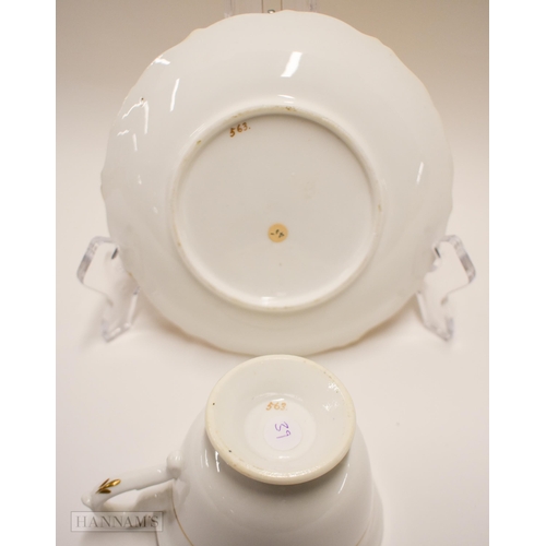 843 - Mid-19th century English teawares: A Coalport cup and saucer painted with flowers pattern 5570, two ... 