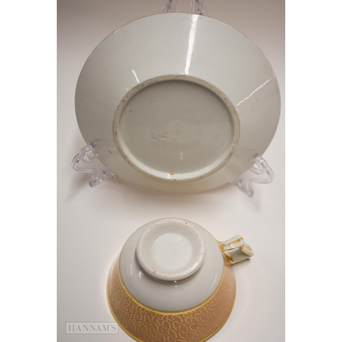 851 - Early 19th century Chamberlain armorial cup and saucer with a unicorn and crown, with latin moto NUN... 