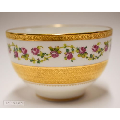 853 - Early 20th century Minton teacup, saucer and side plate painted with trailing roses between thick ac... 