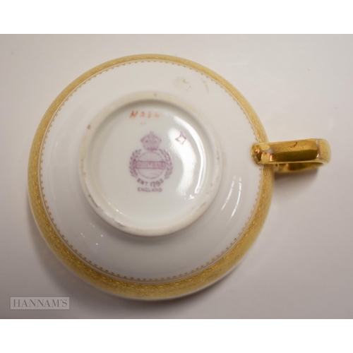 853 - Early 20th century Minton teacup, saucer and side plate painted with trailing roses between thick ac... 