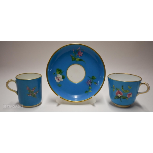 854 - Pre-1891 Minton teacup, coffee cup and saucer, the turquoise ground painted with flowers in raised e... 