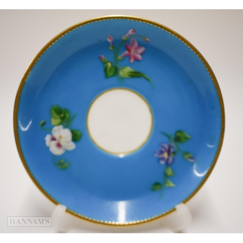 854 - Pre-1891 Minton teacup, coffee cup and saucer, the turquoise ground painted with flowers in raised e... 