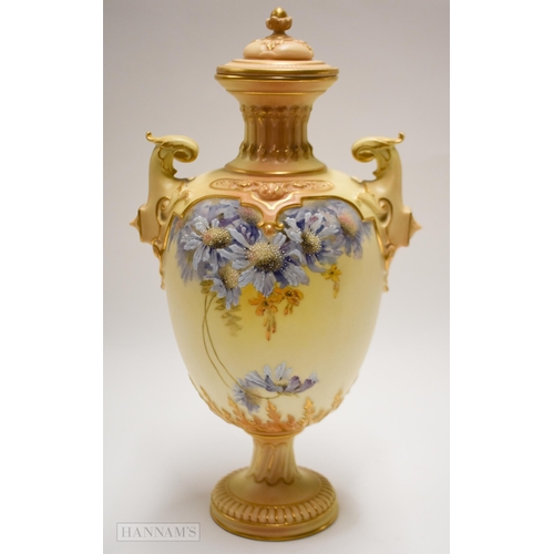 862 - Early 20th century Royal Worcester two handled vase and cover enamelled with blue flowers on a blush... 