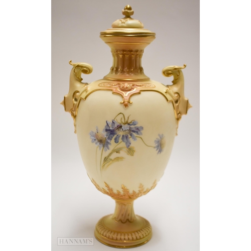 862 - Early 20th century Royal Worcester two handled vase and cover enamelled with blue flowers on a blush... 