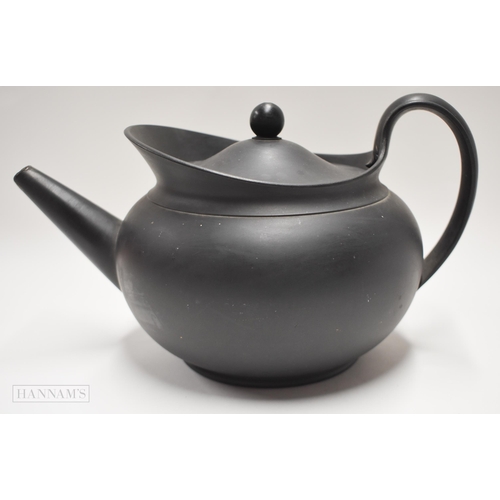 864 - Early 19th Wedgwood black basalt teapot and cover of large size, impressed WEDGWOOD, 28 x 16.5 cm