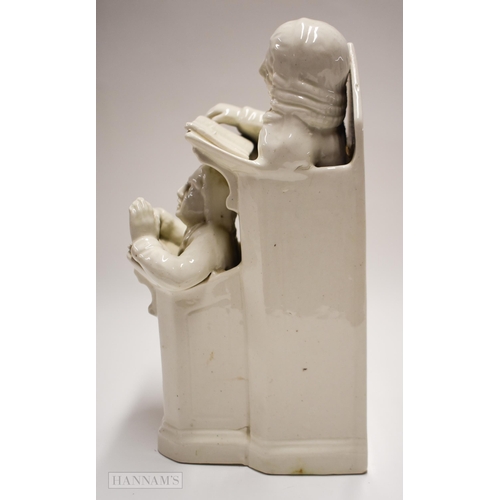 865 - 19th century Ralph Wood style figure of the Vicar and Moses in white glaze. 24 cm high