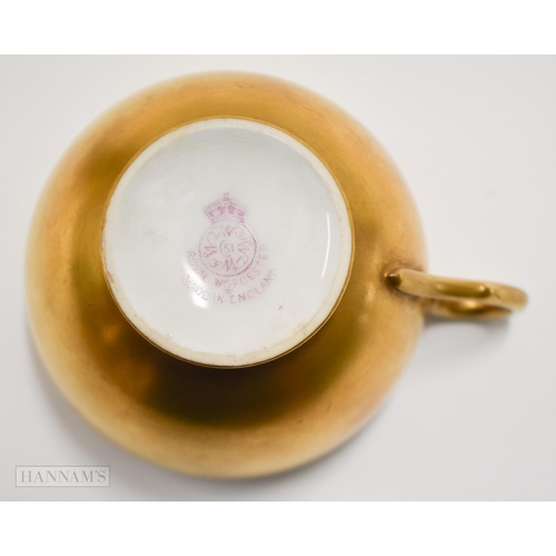 871 - Royal Worcester teacup and saucer, the cup painted inside with fruit by Harry Ayrton, signed the sau... 