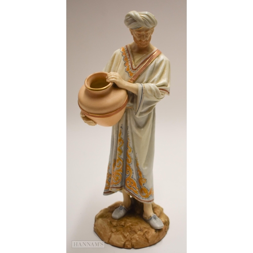 873 - Pre; 1891 Royal Worcester figure, of a Middle Eastern water carrier, decorated in flesh tones, his r... 