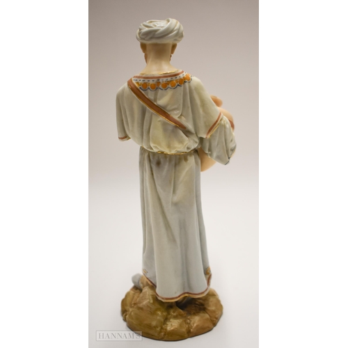 873 - Pre; 1891 Royal Worcester figure, of a Middle Eastern water carrier, decorated in flesh tones, his r... 