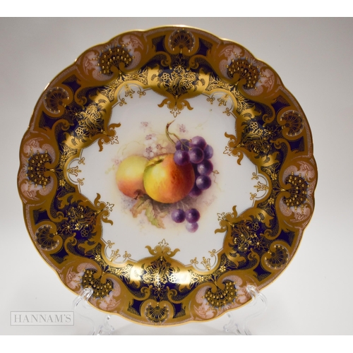 885 - Royal Worcester shaped circular plate, painted by William Ricketts, signed, with apples and grapes, ... 