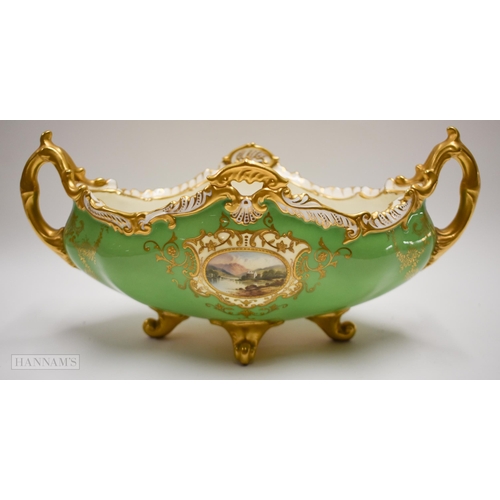 886 - Late 19th early 20th century Coalport two handled boat shaped vase decorated with two gilt panels ea... 