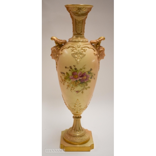 887 - Royal Worcester pedestal vase, with face mask handles and blush painted with flowers, puce marks to ... 