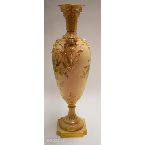 887 - Royal Worcester pedestal vase, with face mask handles and blush painted with flowers, puce marks to ... 