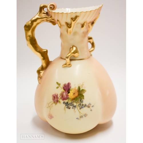 889 - Royal Worcester coral handled jug painted with flowers outlined in gold and hand painted, puce mark ... 