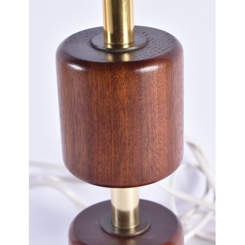 95 - A RETRO CARVED WOOD STYLISH LAMP. 53 cm high.